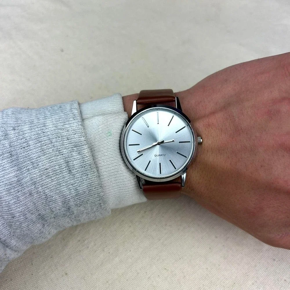 Minimalistic essential vintage style watch stainless steel brown and silver